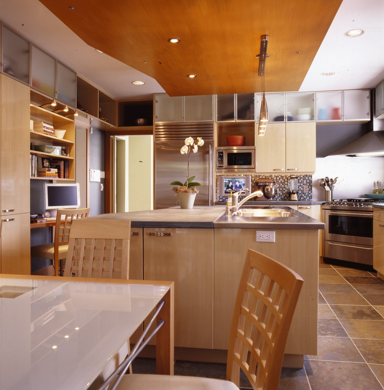 A contemporary kitchen &amp; dining area cabinetry, ceiling, countertop, cuisine classique, interior design, kitchen, real estate, room, brown