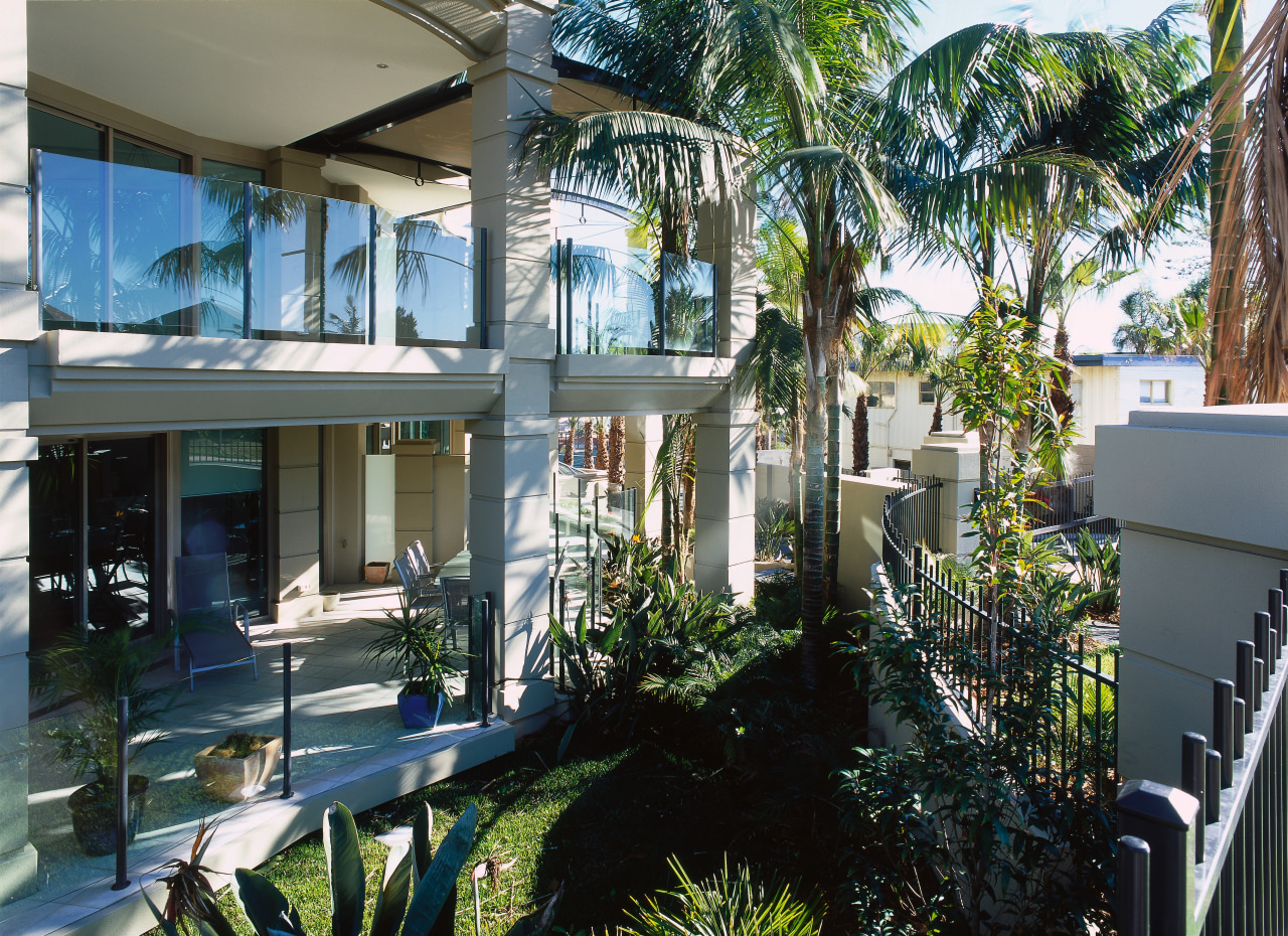 exterior view of landscaping apartment, arecales, condominium, estate, home, house, palm tree, property, real estate, resort, tree, villa, window, black