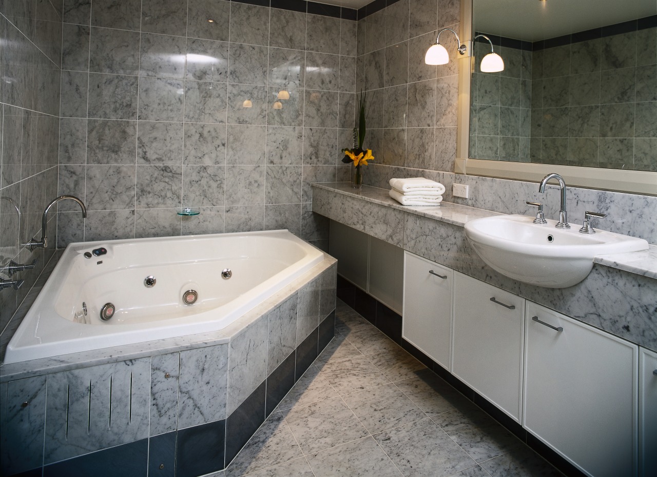 interior view of the bathroom and its fittings bathroom, bathtub, floor, interior design, room, tile, gray, black