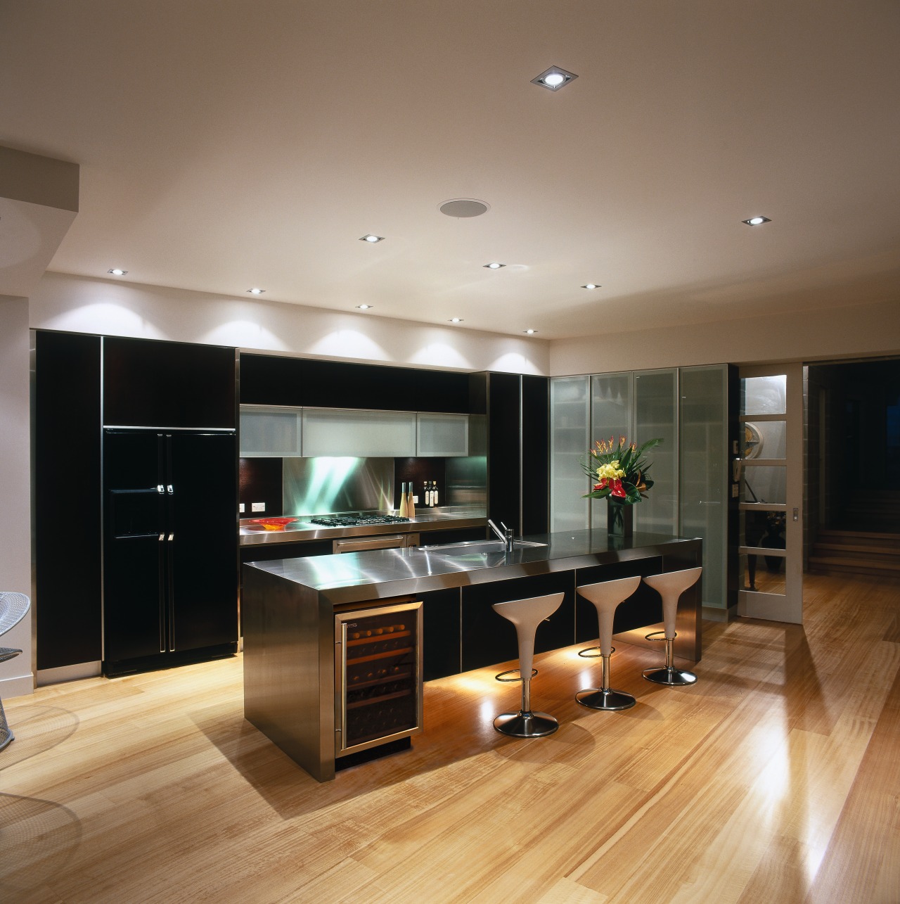 interior view showing cooling storage cabinets cabinetry, countertop, floor, flooring, hardwood, interior design, kitchen, laminate flooring, living room, room, wood flooring, brown