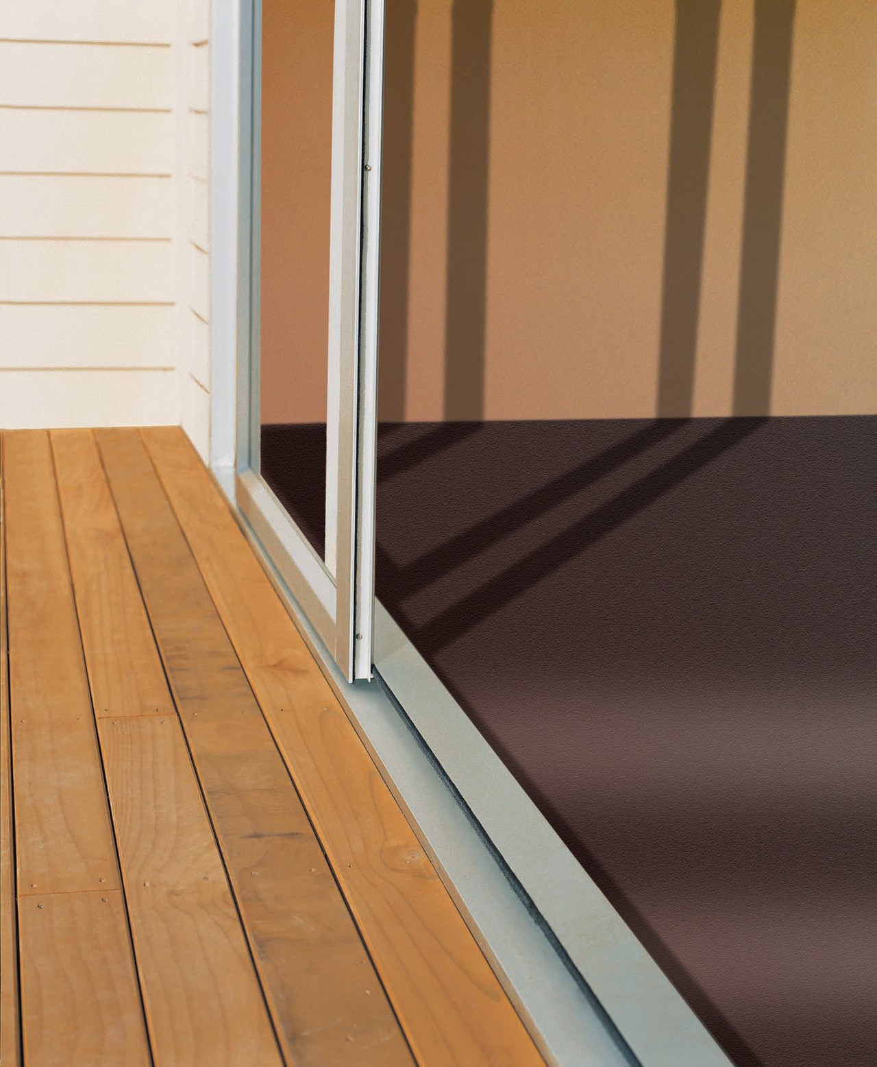 Aluminium sliding door leading from inside to outdoor door, floor, flooring, hardwood, laminate flooring, line, window, wood, wood flooring, wood stain, brown, black