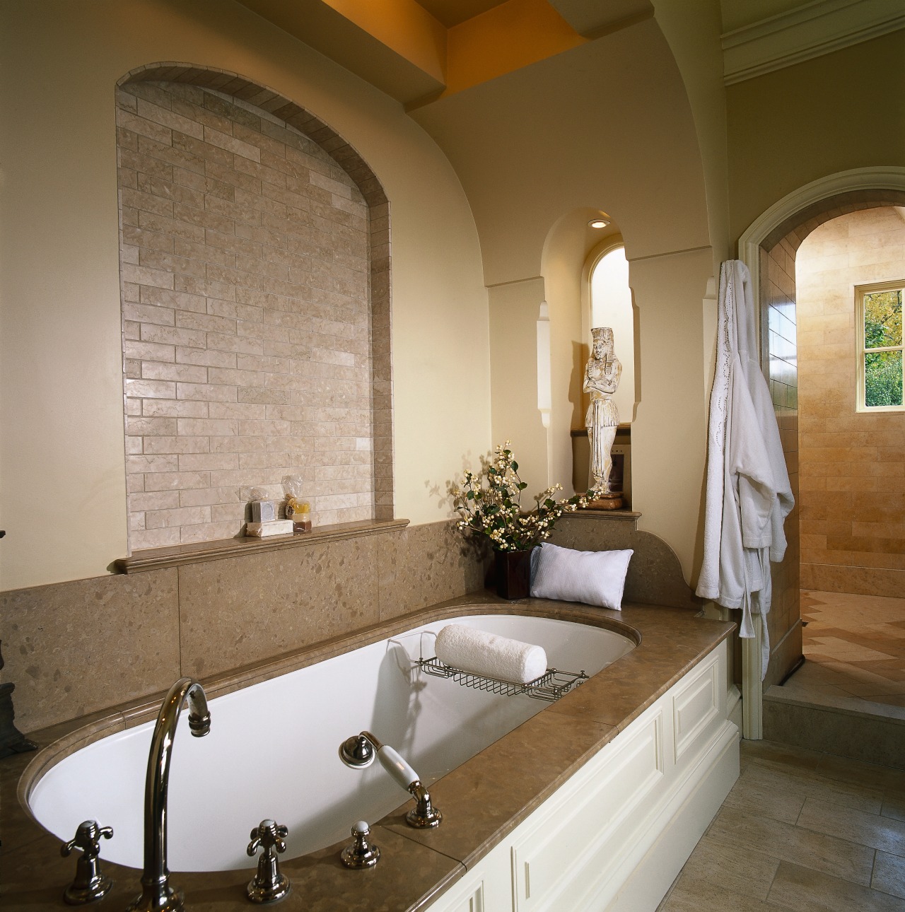 Large bath with limestone surround, brick lined archway, bathroom, bathtub, ceiling, countertop, estate, floor, flooring, home, interior design, room, sink, brown