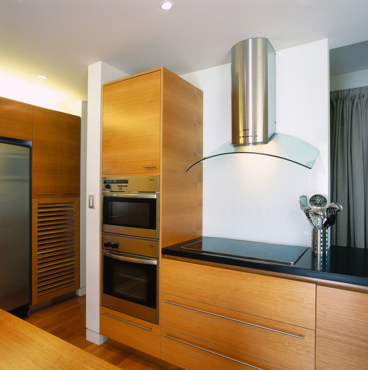 view of the kitchen showing american oak cabinetry/flooring, cabinetry, countertop, home appliance, interior design, kitchen, major appliance, room, gray