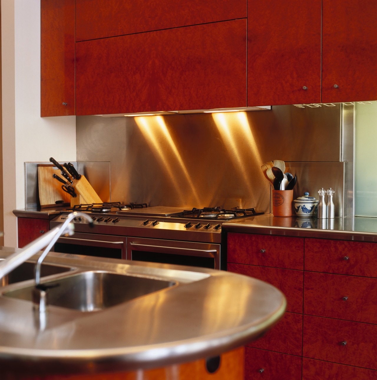 view of the stainless steel  benchtop and cabinetry, countertop, flooring, interior design, kitchen, room, under cabinet lighting, red, brown