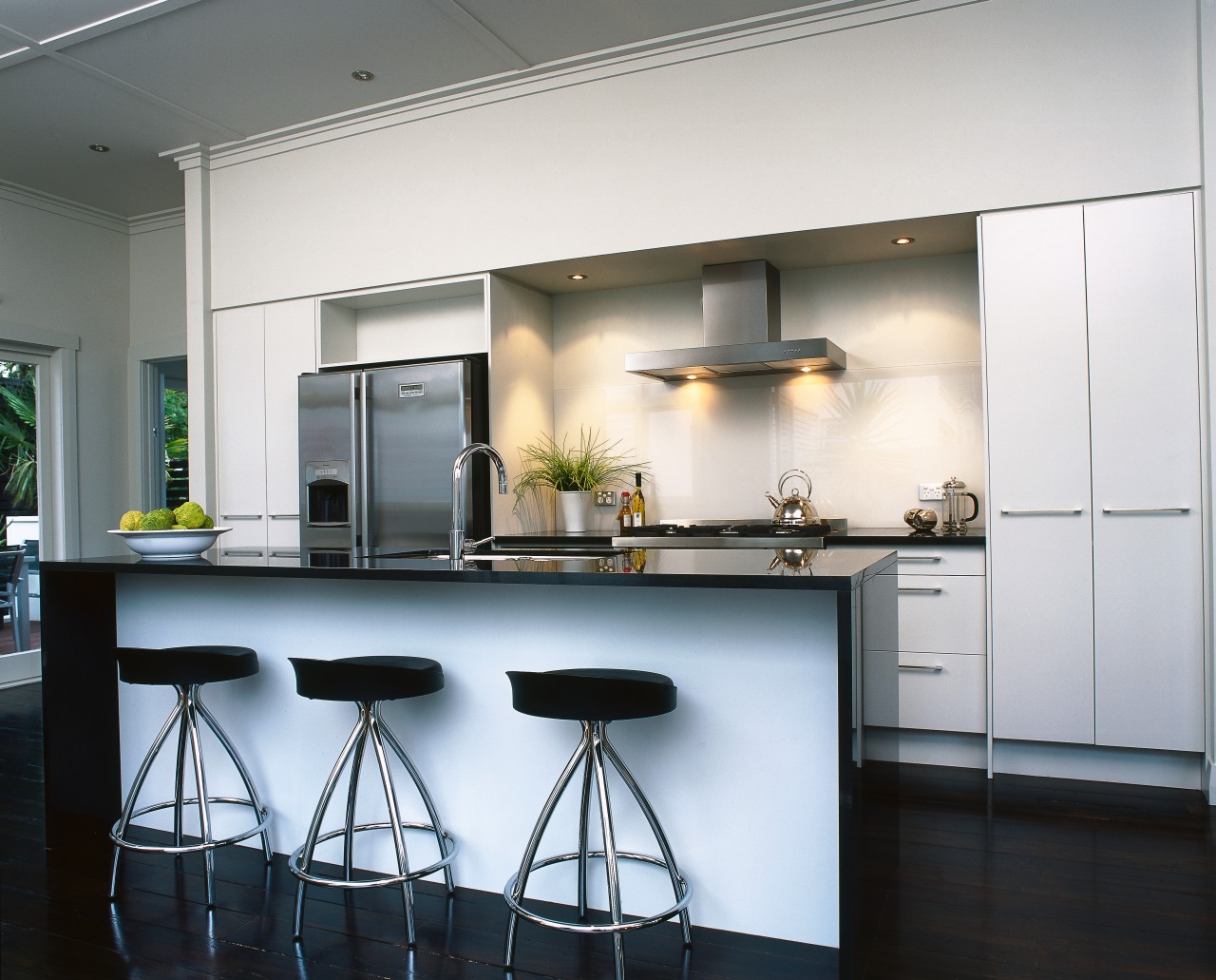 Kitchen with light coloured cabinetry and black granite cabinetry, countertop, interior design, kitchen, room, white