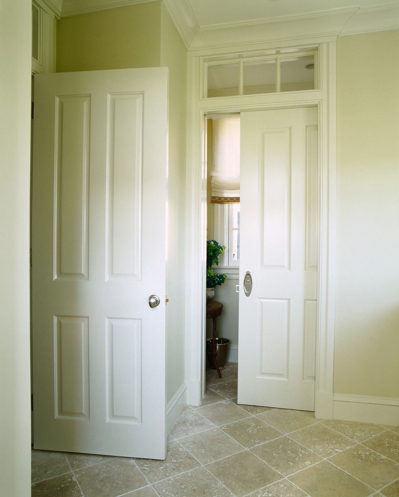 View of a white swinging a sliding door, ceiling, daylighting, door, floor, flooring, hardwood, home, house, interior design, molding, property, real estate, room, wall, window, wood, yellow