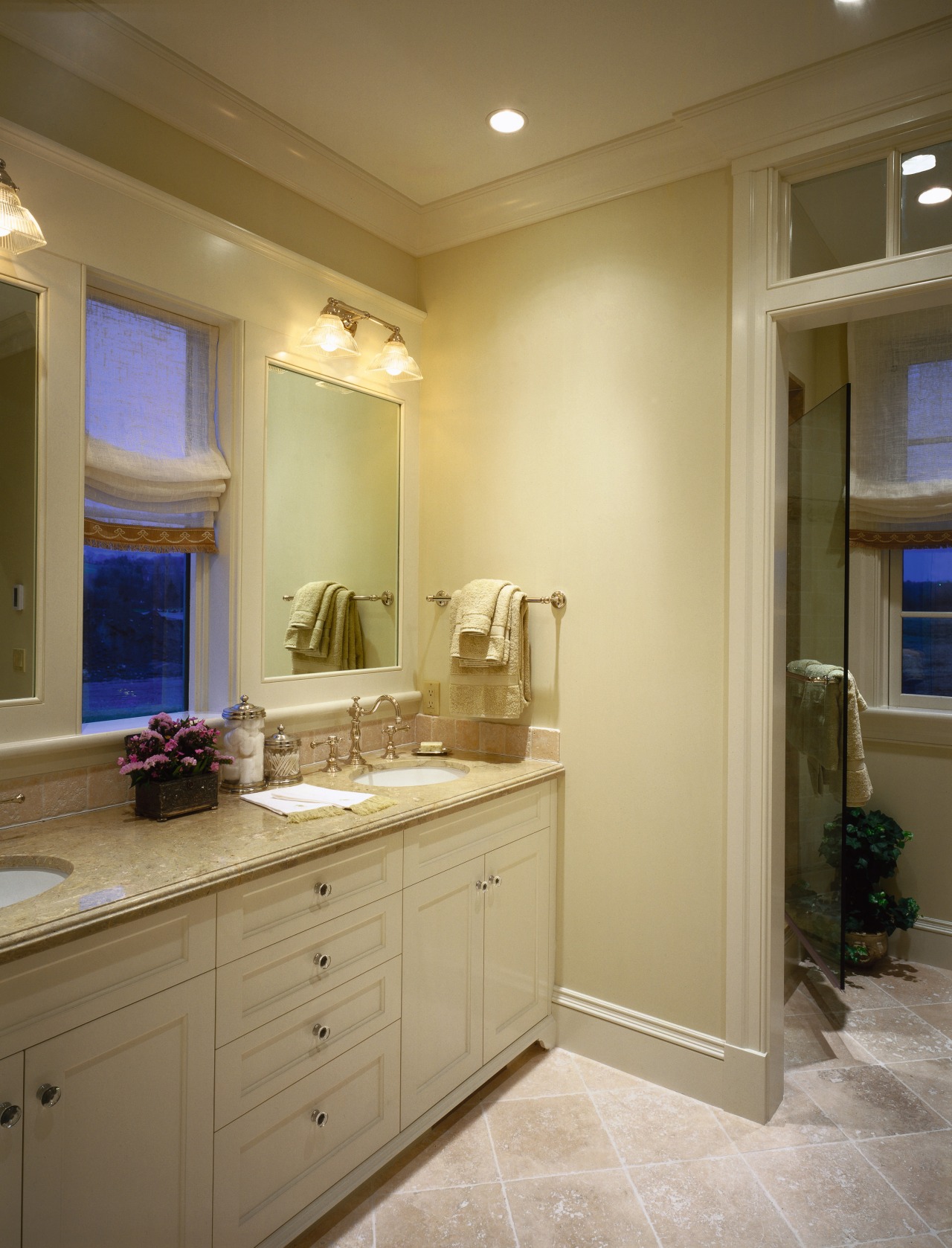 View of a bathroom, off-white tiled flooring, white bathroom, bathroom accessory, bathroom cabinet, cabinetry, ceiling, countertop, floor, home, interior design, kitchen, lighting, room, sink, brown, orange