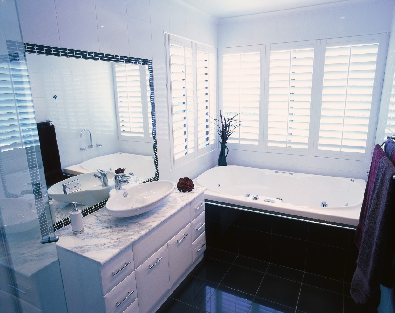 Bathroom with white wall tiles, black floor tiles bathroom, bathtub, floor, home, interior design, property, room, window, white, gray