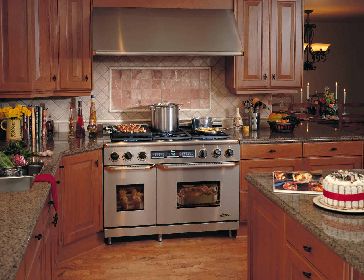 View of a kitchen, stainles steel oven, metal cabinetry, countertop, cuisine classique, flooring, interior design, kitchen, room, brown