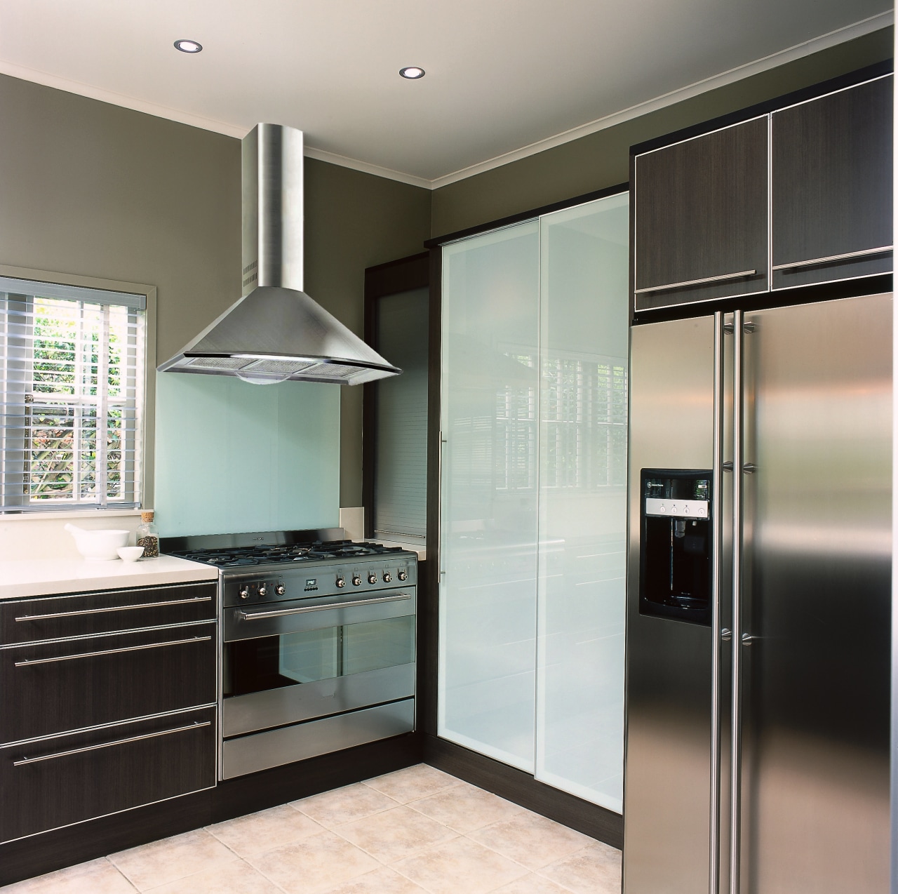 view of the kitchen and rangehood cabinetry, countertop, home appliance, interior design, kitchen, real estate, room, gray, black
