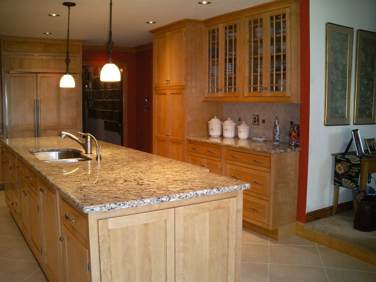 View of a kitchen are, wooden cabinetry, cream cabinetry, countertop, cuisine classique, floor, flooring, hardwood, home, interior design, kitchen, real estate, room, tile, brown