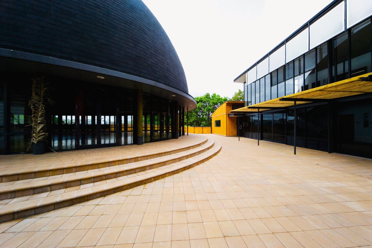 Sandstone coloured paving and steps between two buildings. architecture, building, facade, sky, white, black
