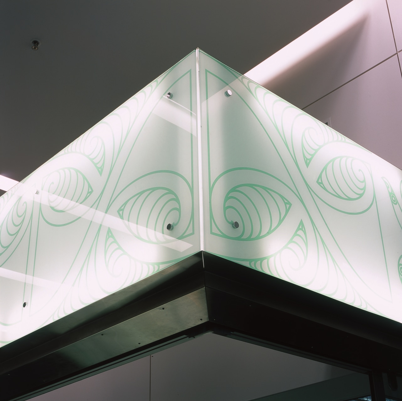 Backlit panels with Koru design. angle, architecture, daylighting, glass, product design, structure, black, gray, white
