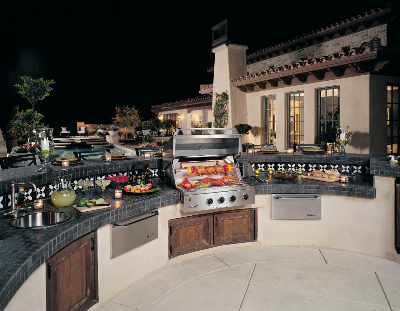 View of an overall patio area, concrete tiled black, gray
