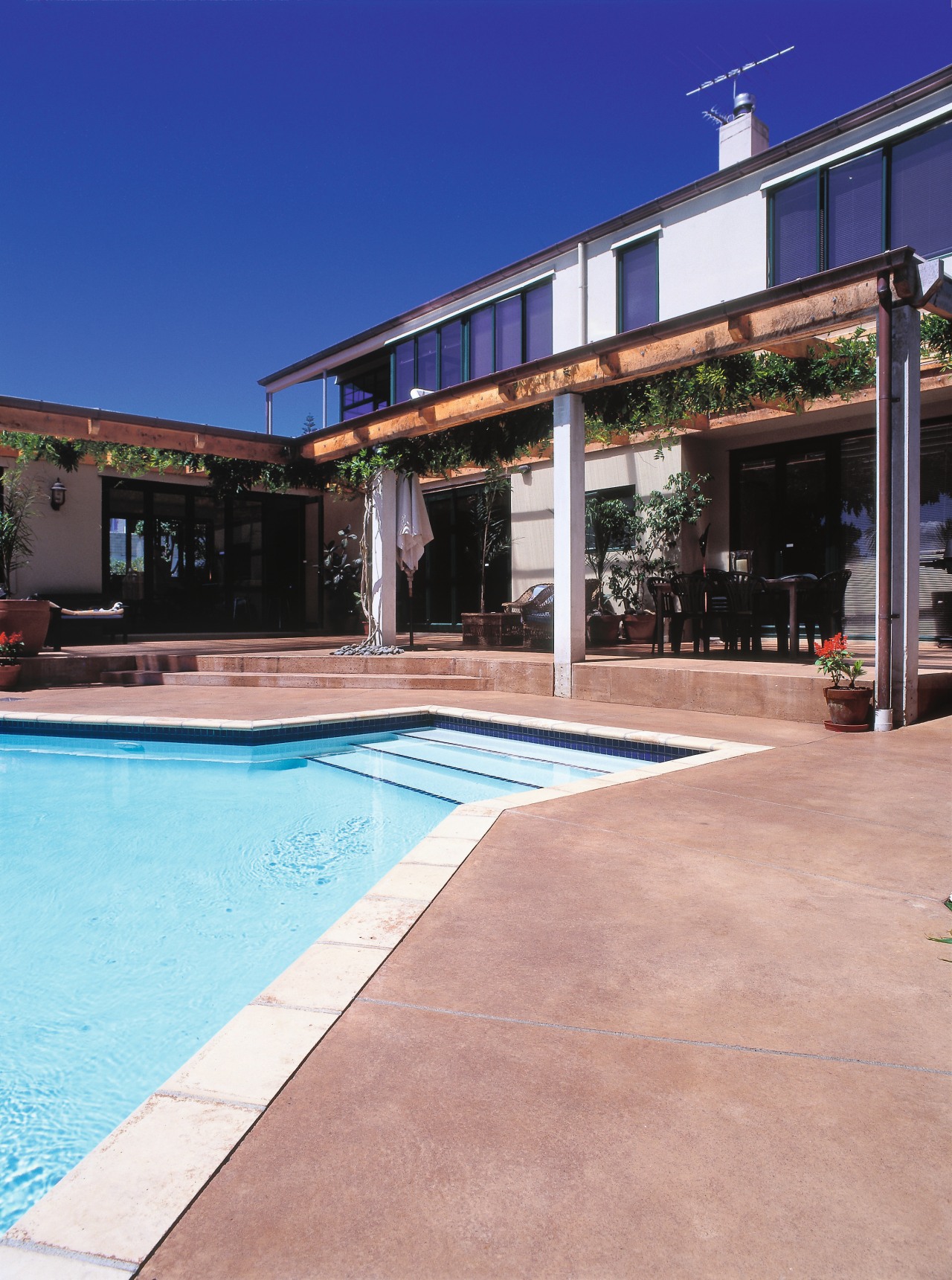 Outdoor pool area with coloured concrete paving, pergola estate, house, leisure, leisure centre, property, real estate, residential area, swimming pool, orange, blue