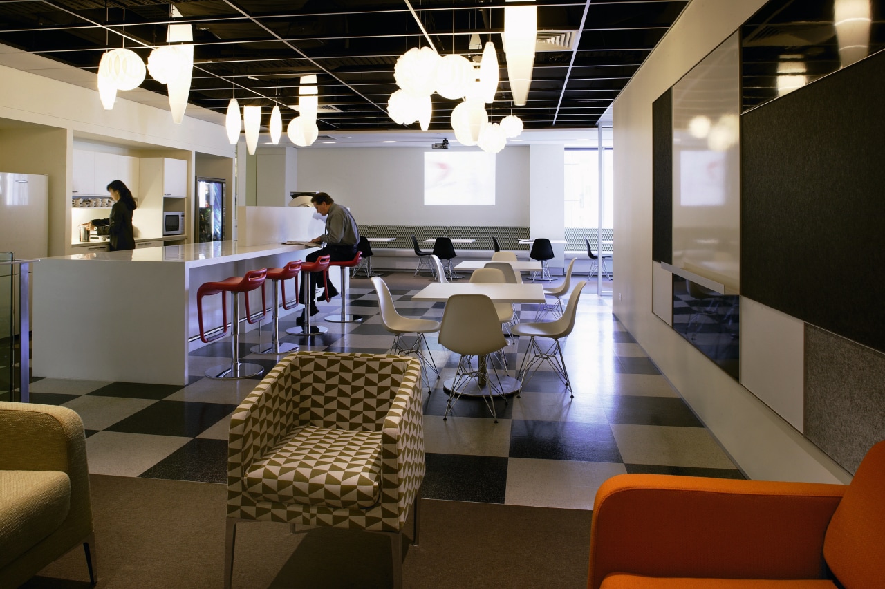 A view of the breakout area, green, brown furniture, interior design, office, restaurant, table, brown