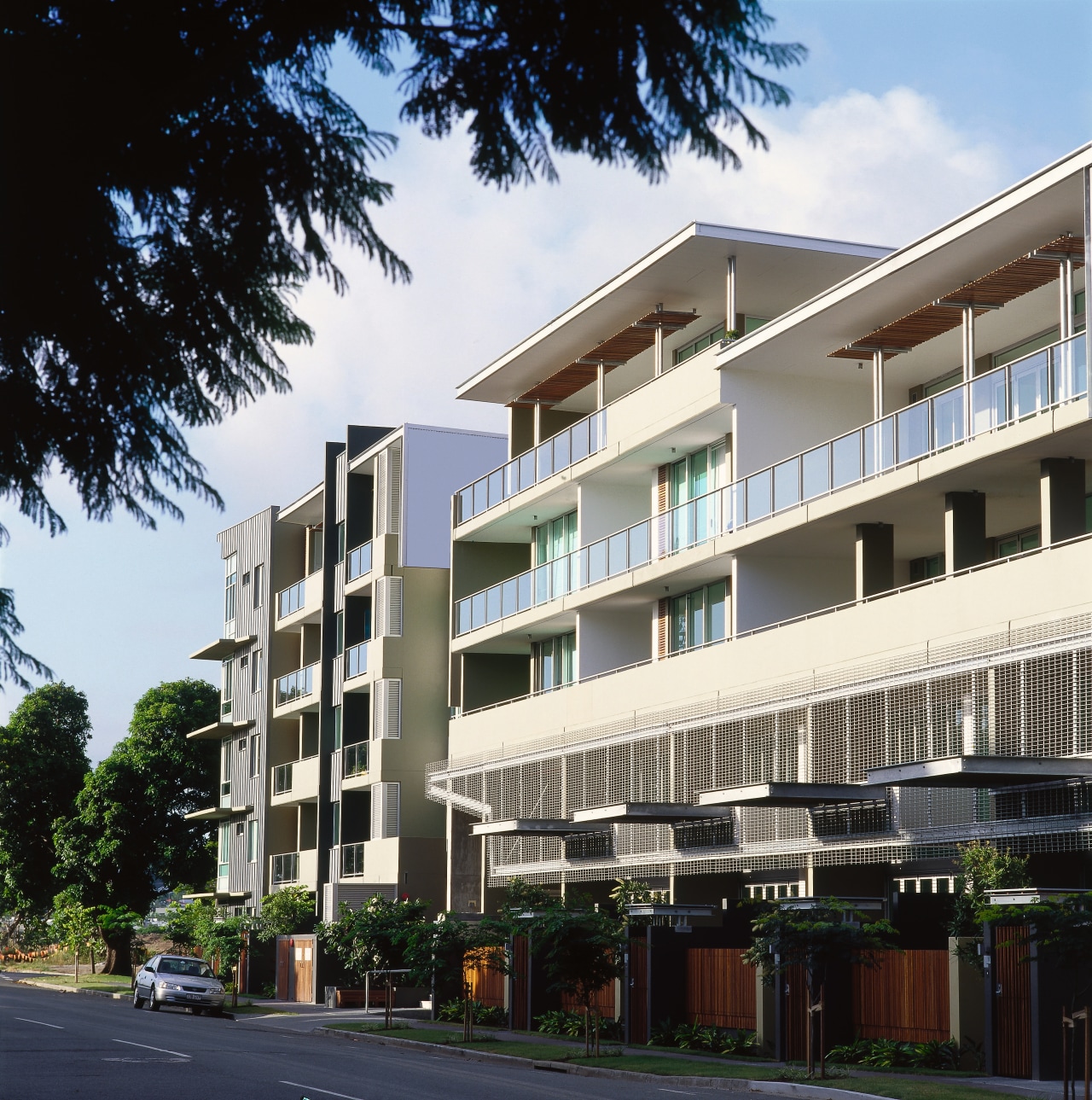 view of the apartment building apartment, architecture, building, commercial building, condominium, corporate headquarters, elevation, estate, facade, house, metropolitan area, mixed use, neighbourhood, property, real estate, residential area, window, black, white