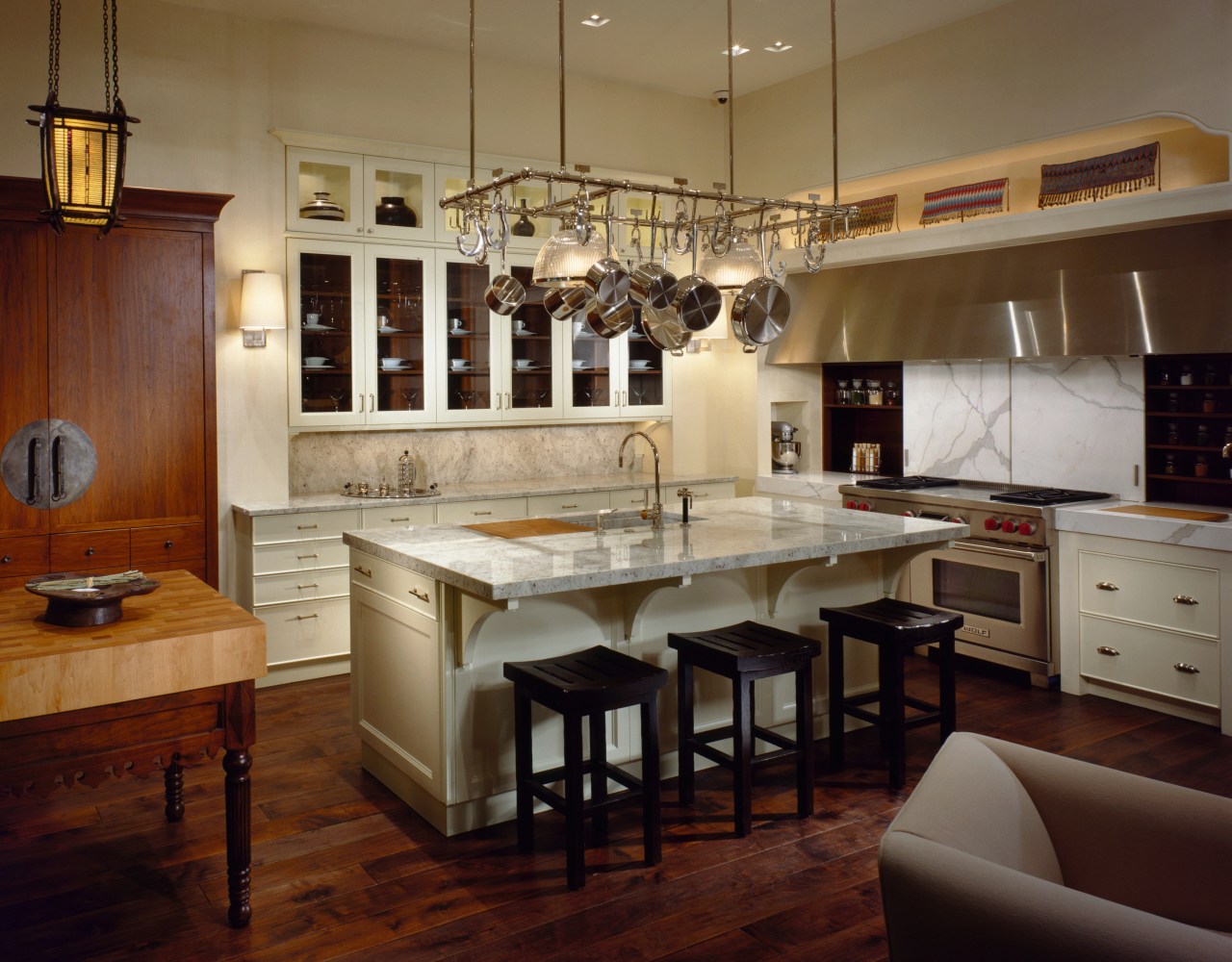 view of this ktchen by de guillo showing cabinetry, ceiling, countertop, cuisine classique, flooring, hardwood, interior design, kitchen, room, wood flooring, brown, red