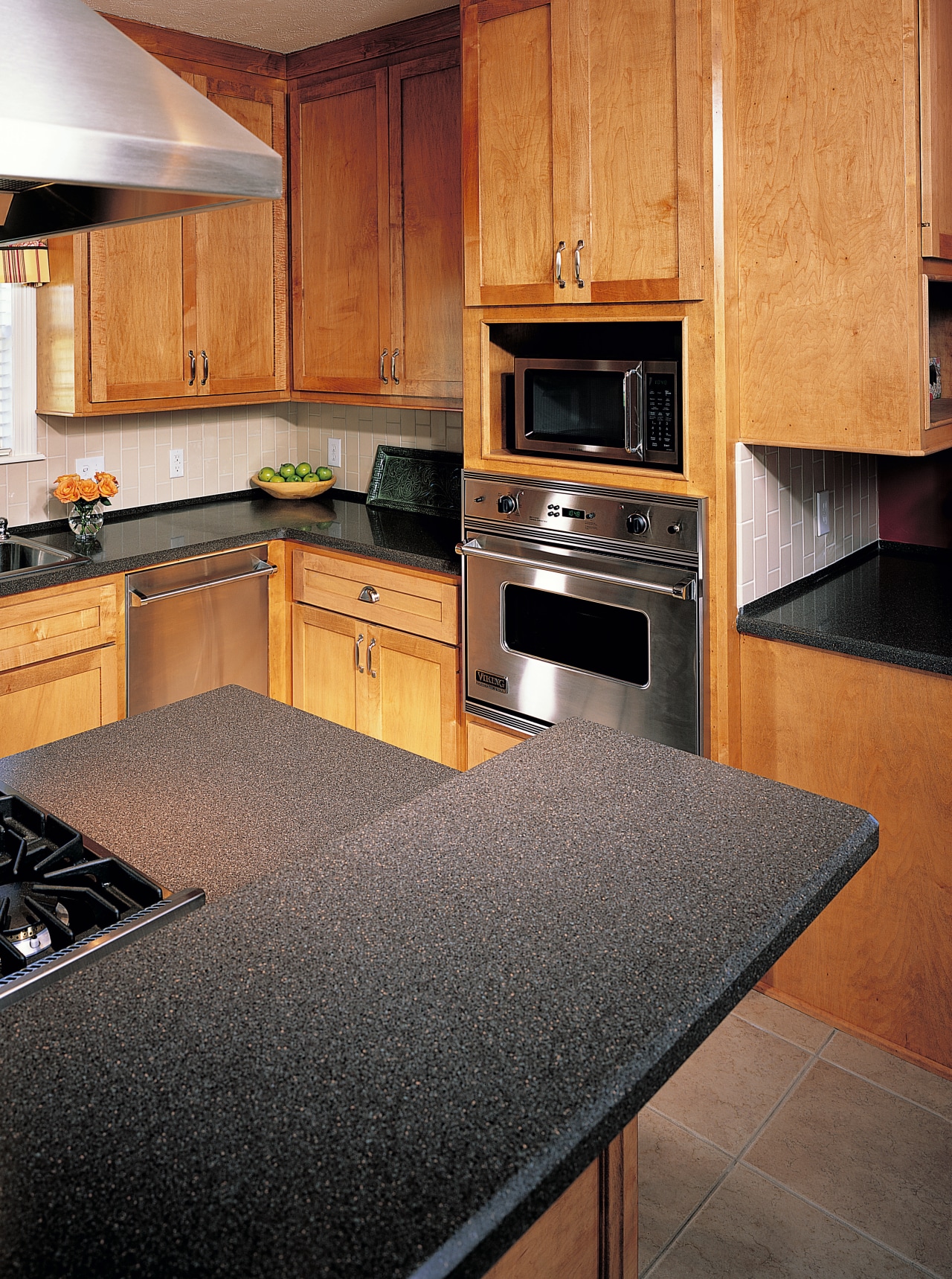 view of the hi-macs kitchen benchtop cabinetry, countertop, floor, flooring, hardwood, interior design, kitchen, room, wood, black, orange