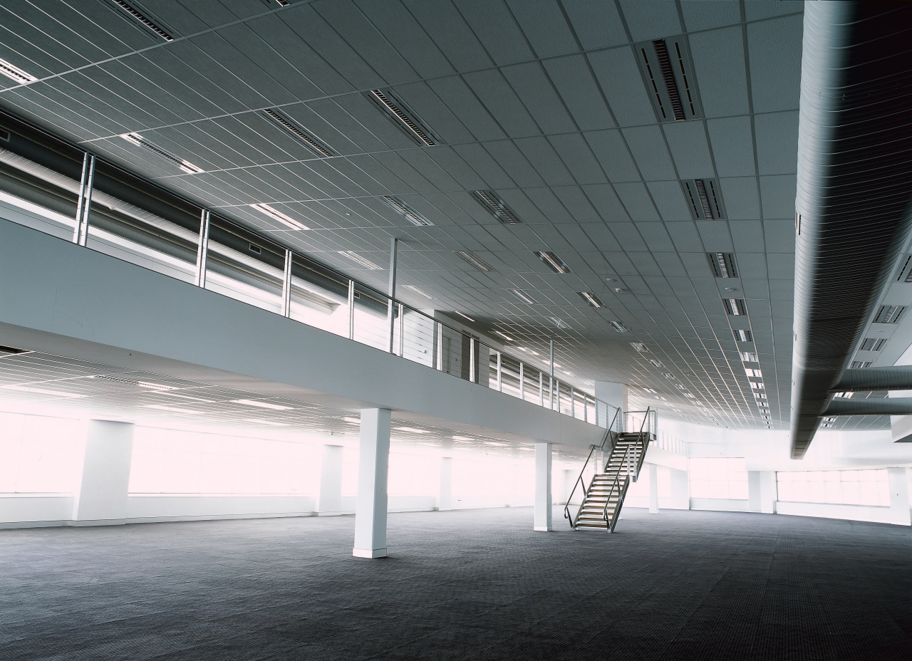 view of the open office space architecture, building, ceiling, convention center, daylighting, daytime, fixed link, line, metropolitan area, sky, structure, gray, black