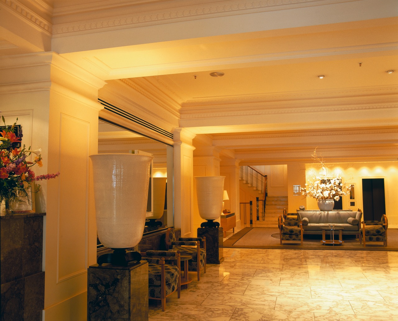 Lobby area with ornate columns and ceiling mouldings. ceiling, estate, flooring, function hall, home, interior design, lobby, real estate, room, orange, brown