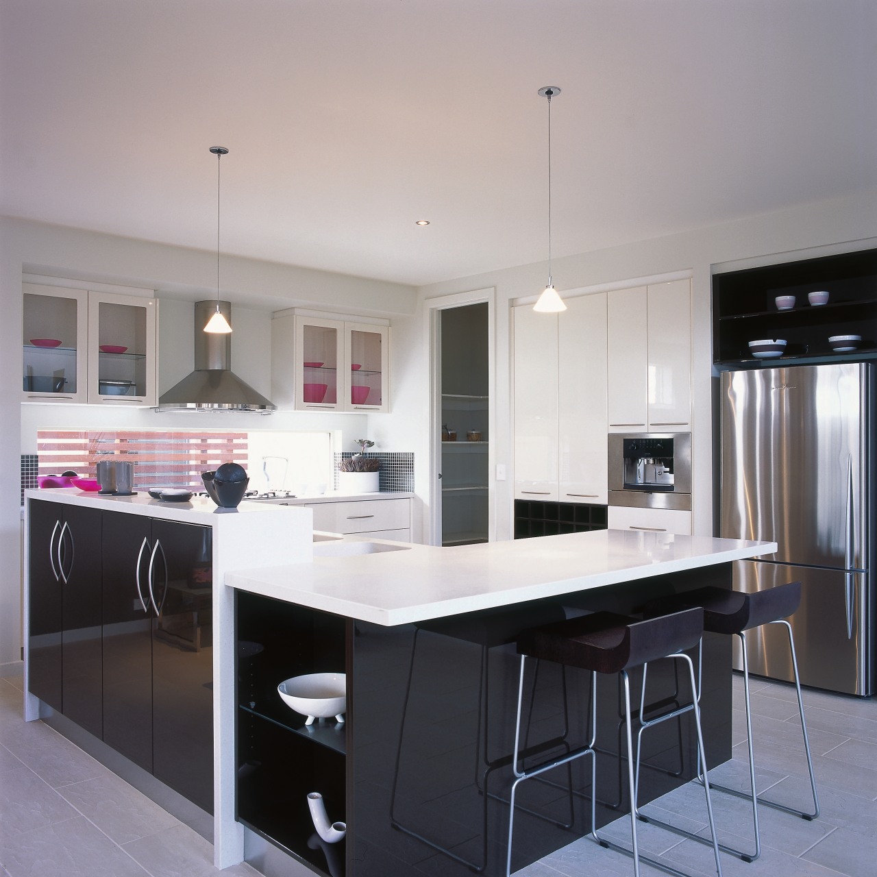 Kitchen with dark coloured cabinetry and white benchtops cabinetry, countertop, cuisine classique, interior design, kitchen, real estate, room, gray, black