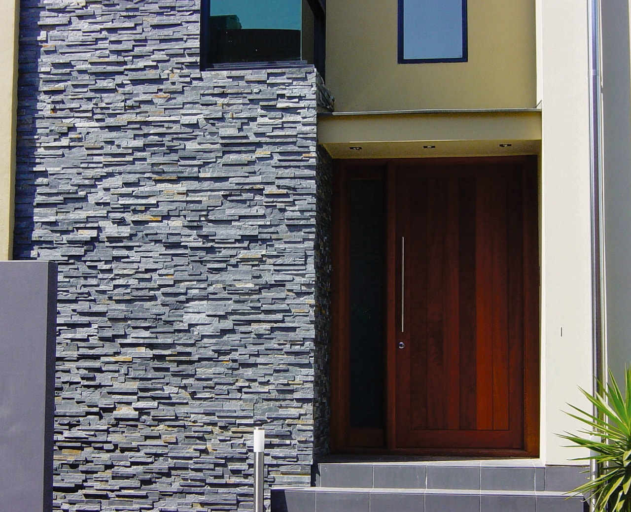 view of the homestone  modulised natural stone architecture, brick, brickwork, door, facade, house, siding, wall, window, gray