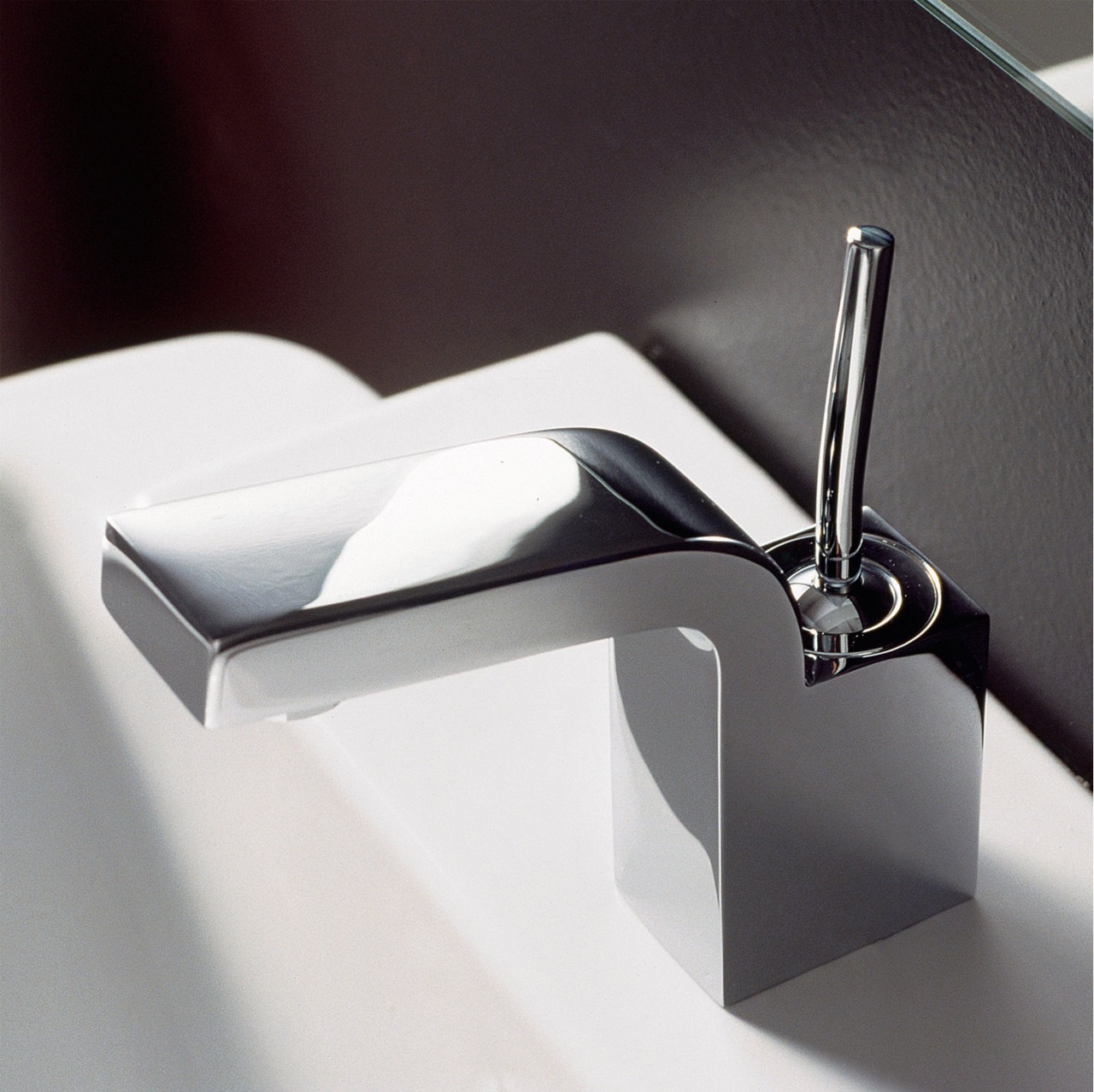 View of a chrome tap attached to a hardware, plumbing fixture, product, product design, tap, black, white, gray