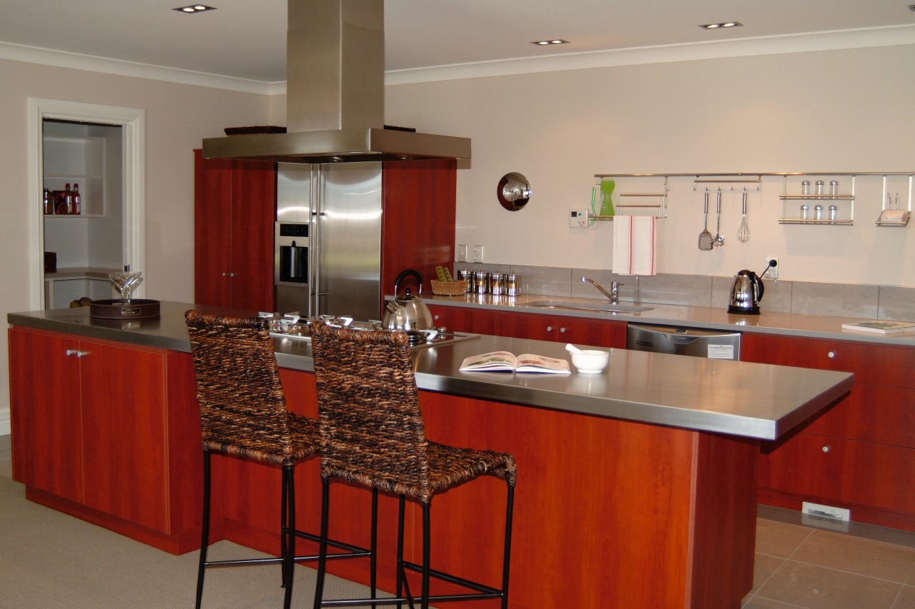 view of the kitchen showing smeg stainless steel cabinetry, countertop, cuisine classique, flooring, interior design, kitchen, property, real estate, room, red