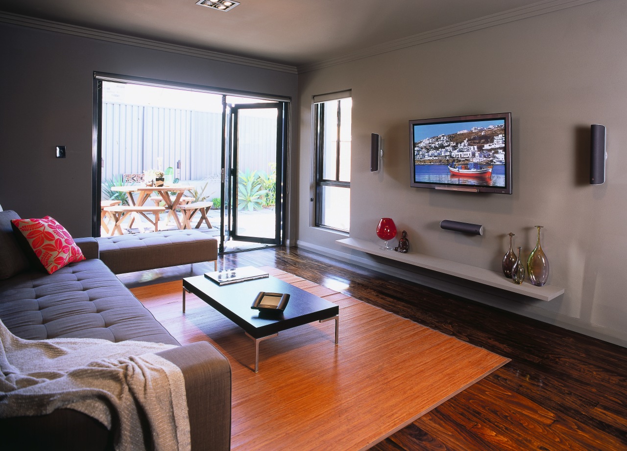 view of the lounge and home/audio entertainment system floor, flooring, hardwood, home, interior design, living room, property, real estate, room, window, wood, gray, black