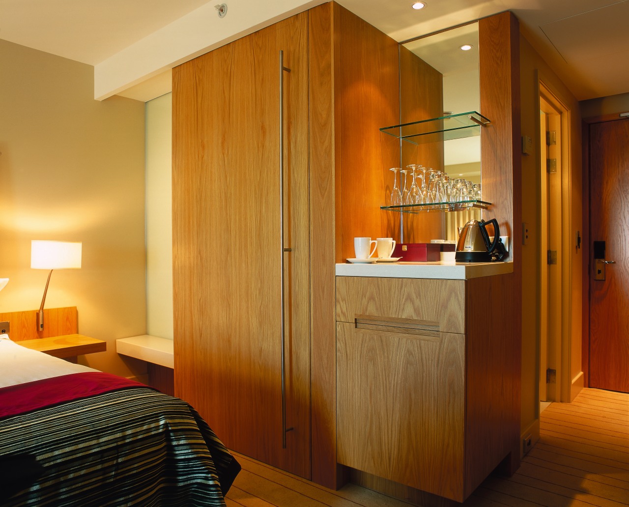 Hotel room with timber wall panelling and cabinetry, cabinetry, interior design, real estate, room, suite, wood, brown, orange