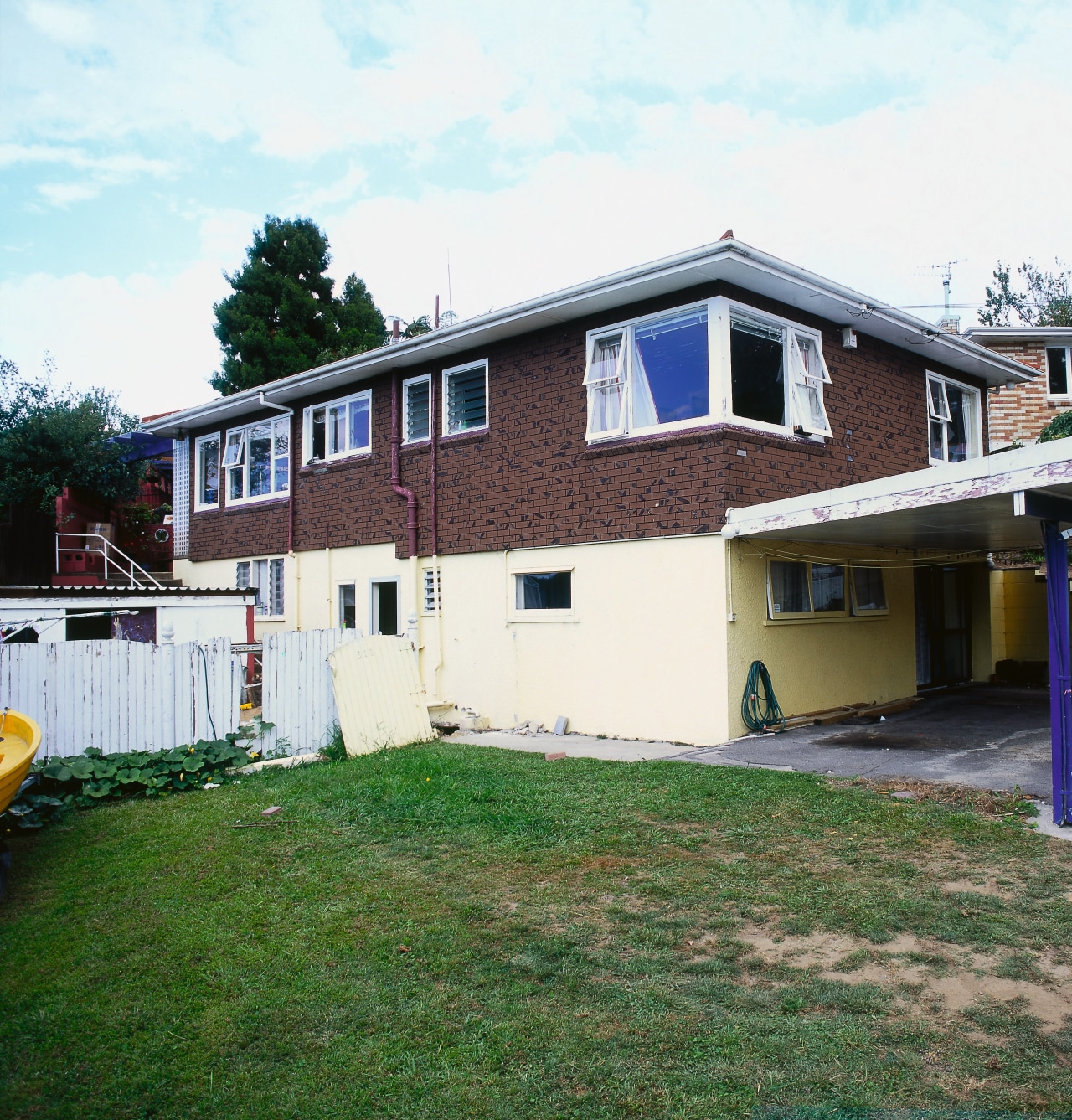 A view of the house before it was backyard, cottage, elevation, estate, facade, home, house, property, real estate, residential area, roof, siding, window, yard, white