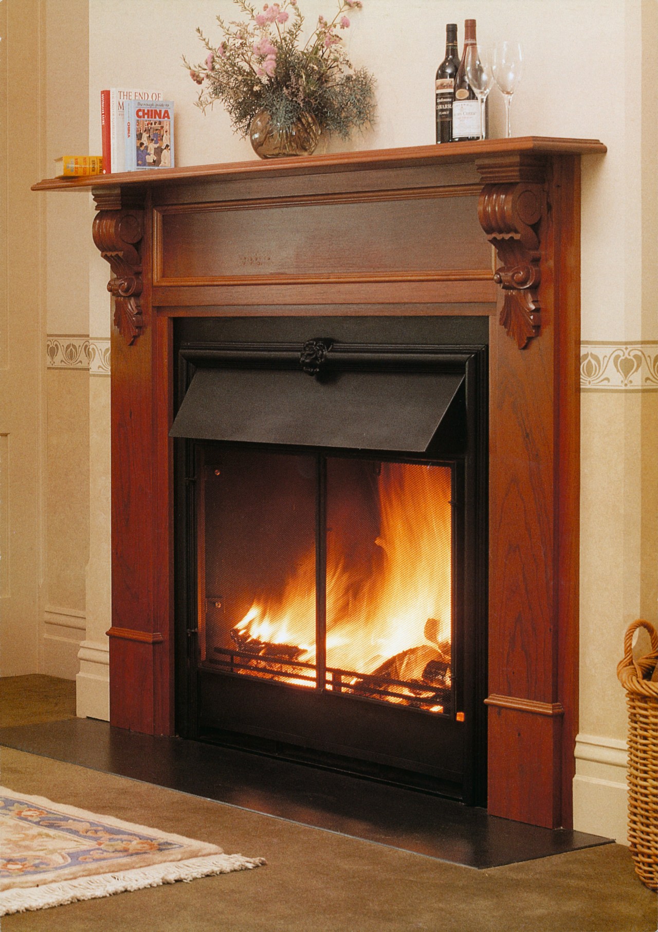 A view of a wooden fireplace surrounded with fire screen, fireplace, hearth, heat, home appliance, wood burning stove, brown