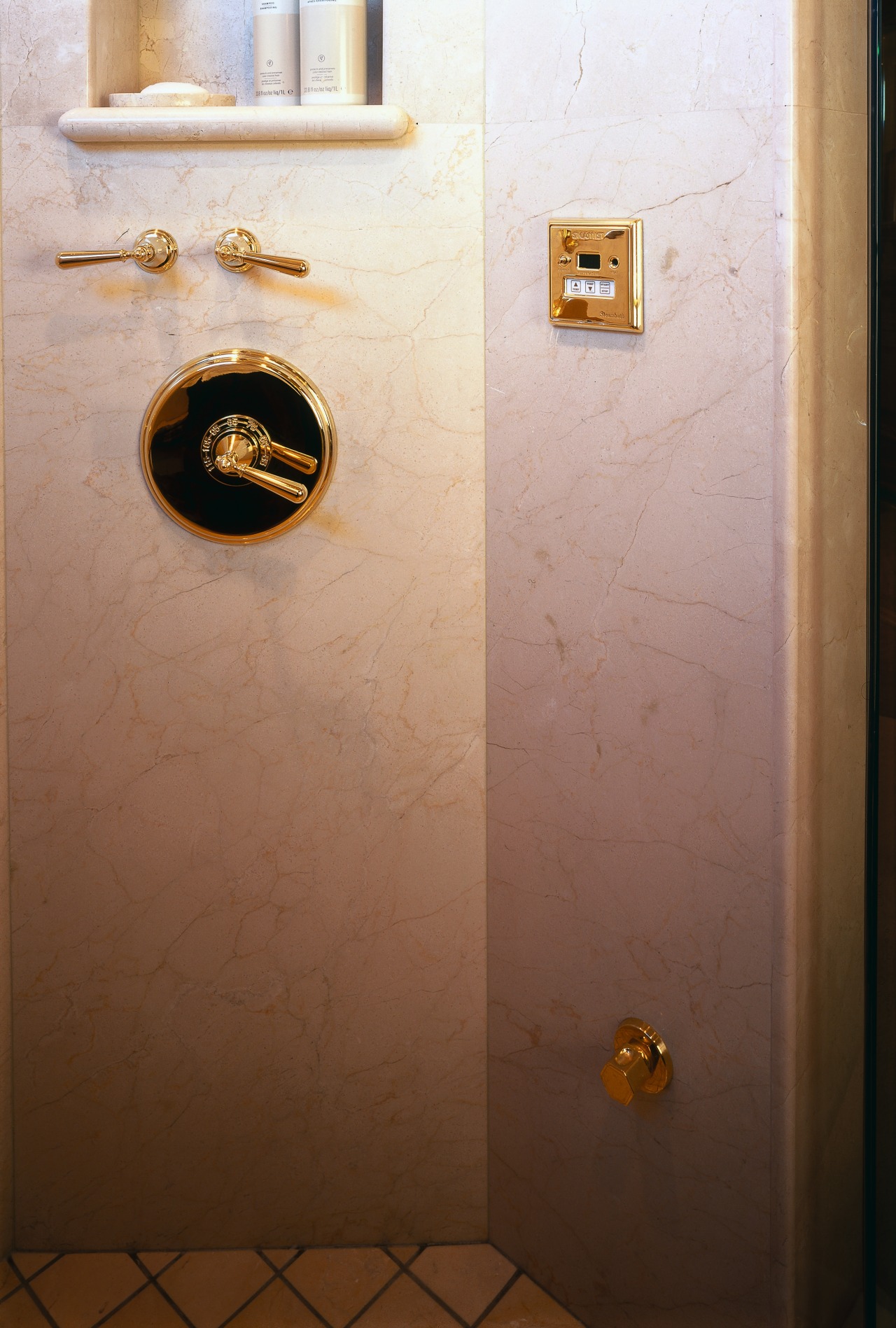 A view of the faucetry and steamist system bathroom, door, floor, plumbing fixture, room, tile, toilet, wall, yellow, brown