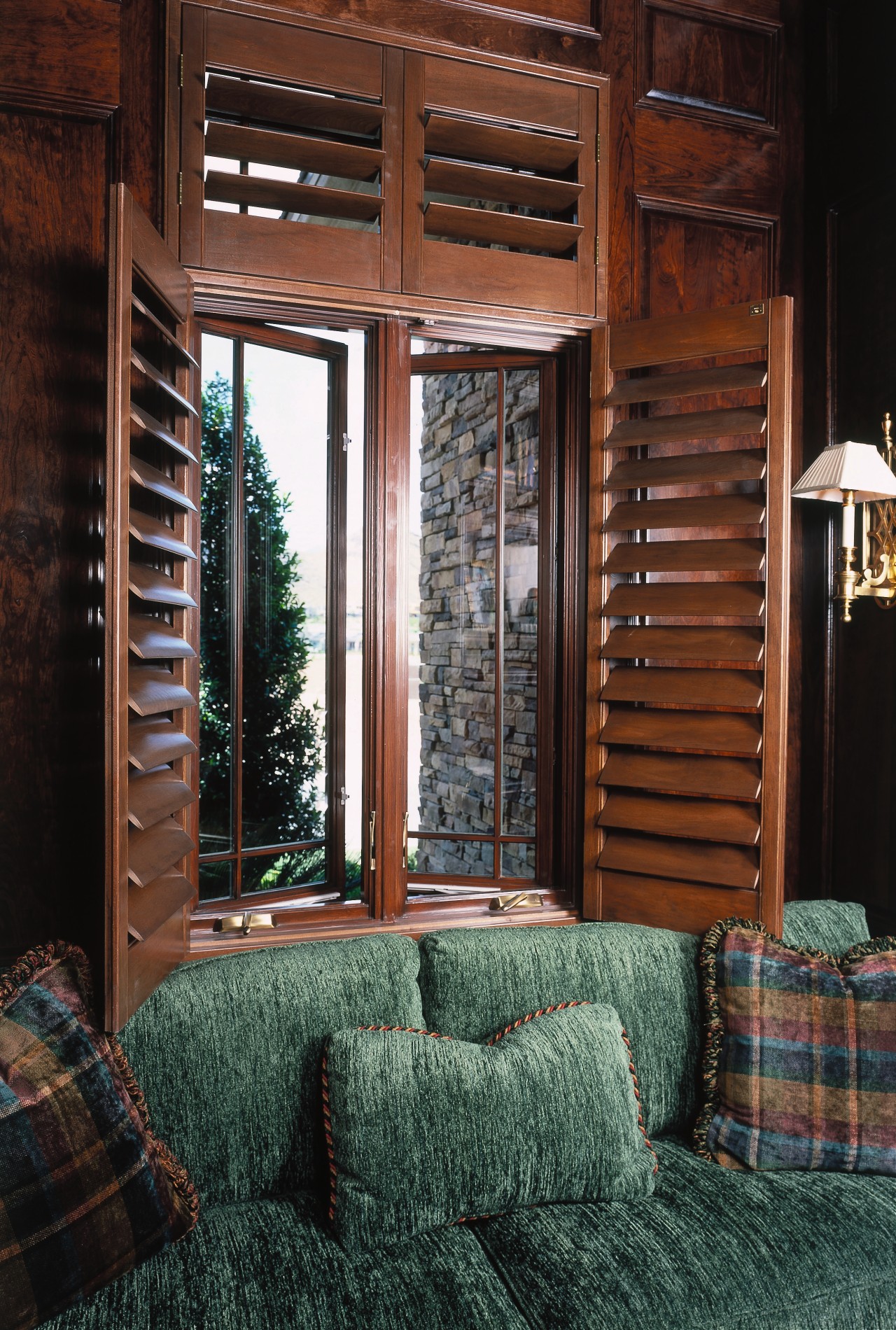 A view of some wooden bordered windows and door, furniture, home, interior design, wall, window, wood, black