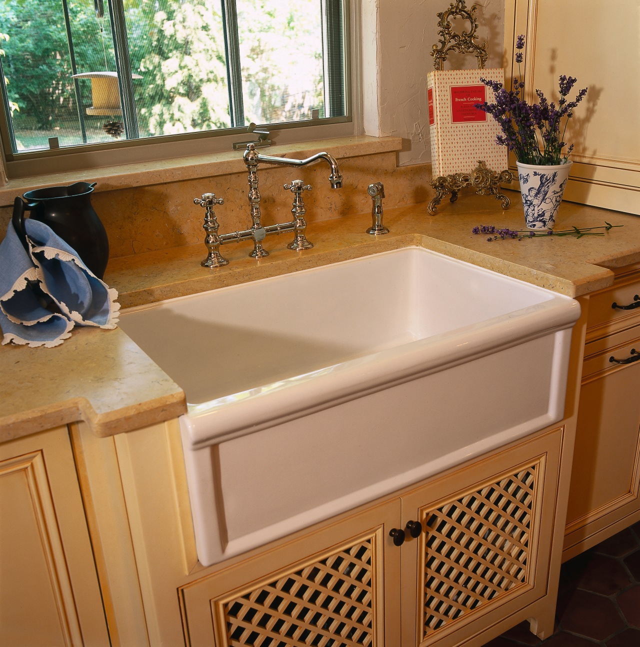 view of this bathroom area showing timber cabinetry, bathroom, bathroom accessory, bathroom cabinet, cabinetry, countertop, floor, flooring, furniture, kitchen, plumbing fixture, room, sink, brown, orange