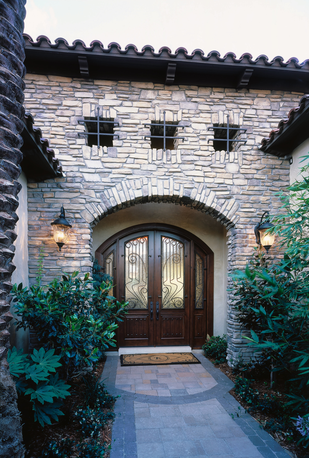 view of this timber arch front door designed arch, architecture, building, cottage, courtyard, estate, facade, home, house, mansion, outdoor structure, property, real estate, residential area, roof, window, black