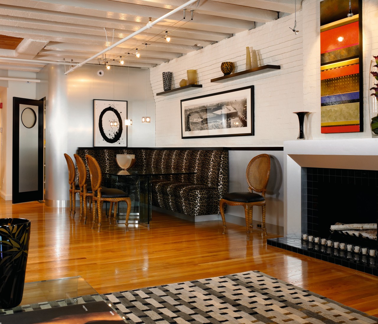 view of the apartment featuring a built ceiling, floor, flooring, furniture, hardwood, interior design, living room, lobby, real estate, room, wall, wood flooring, brown, gray