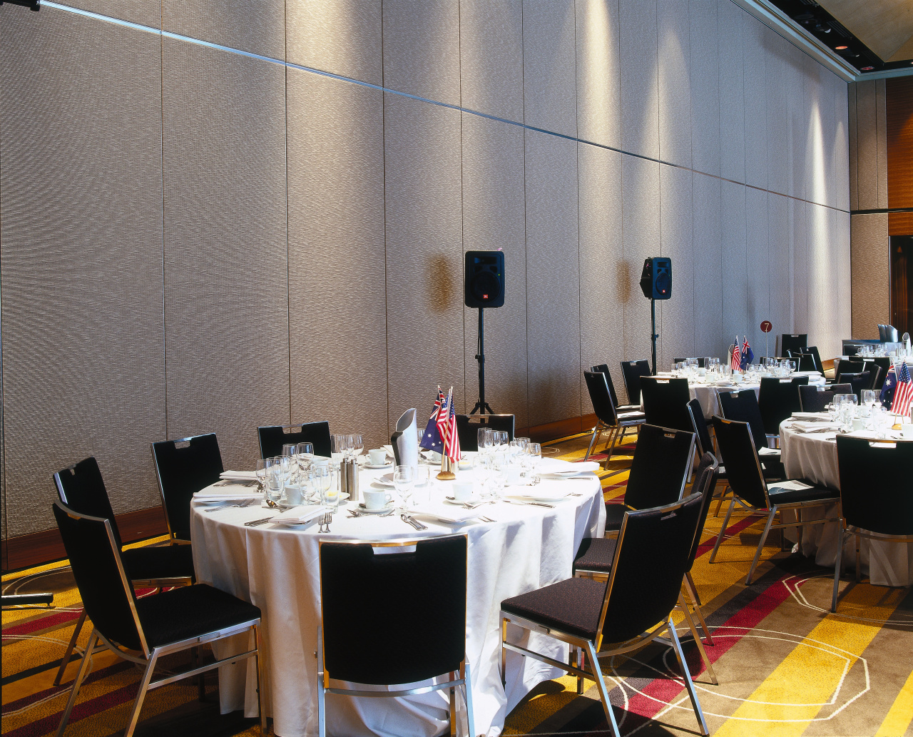 Hotel function room with round tables, black chairs, banquet, conference hall, function hall, interior design, restaurant, table, tableware, gray, black