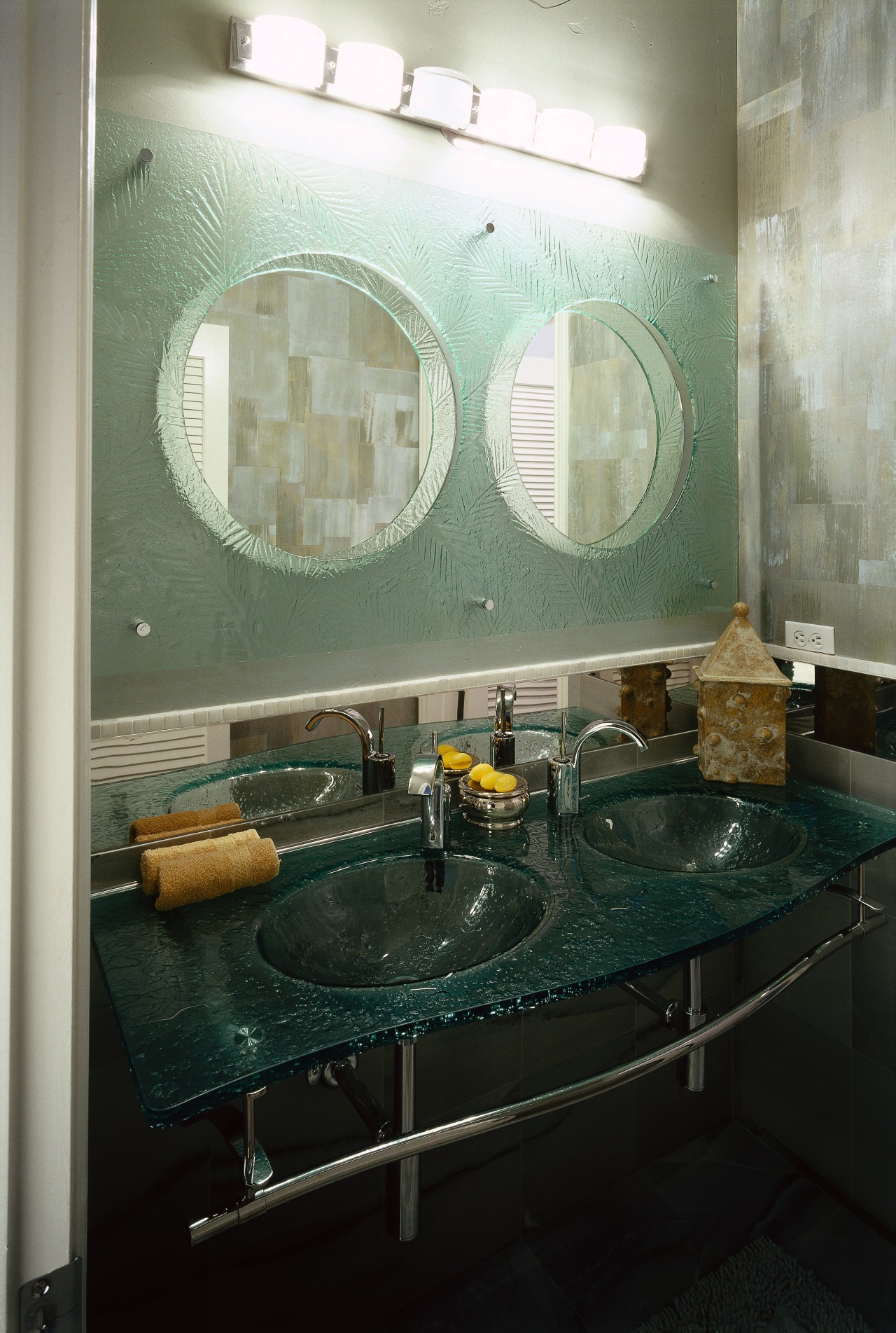 view of the glass mirror surround provided by bathroom, countertop, glass, interior design, room, sink, black