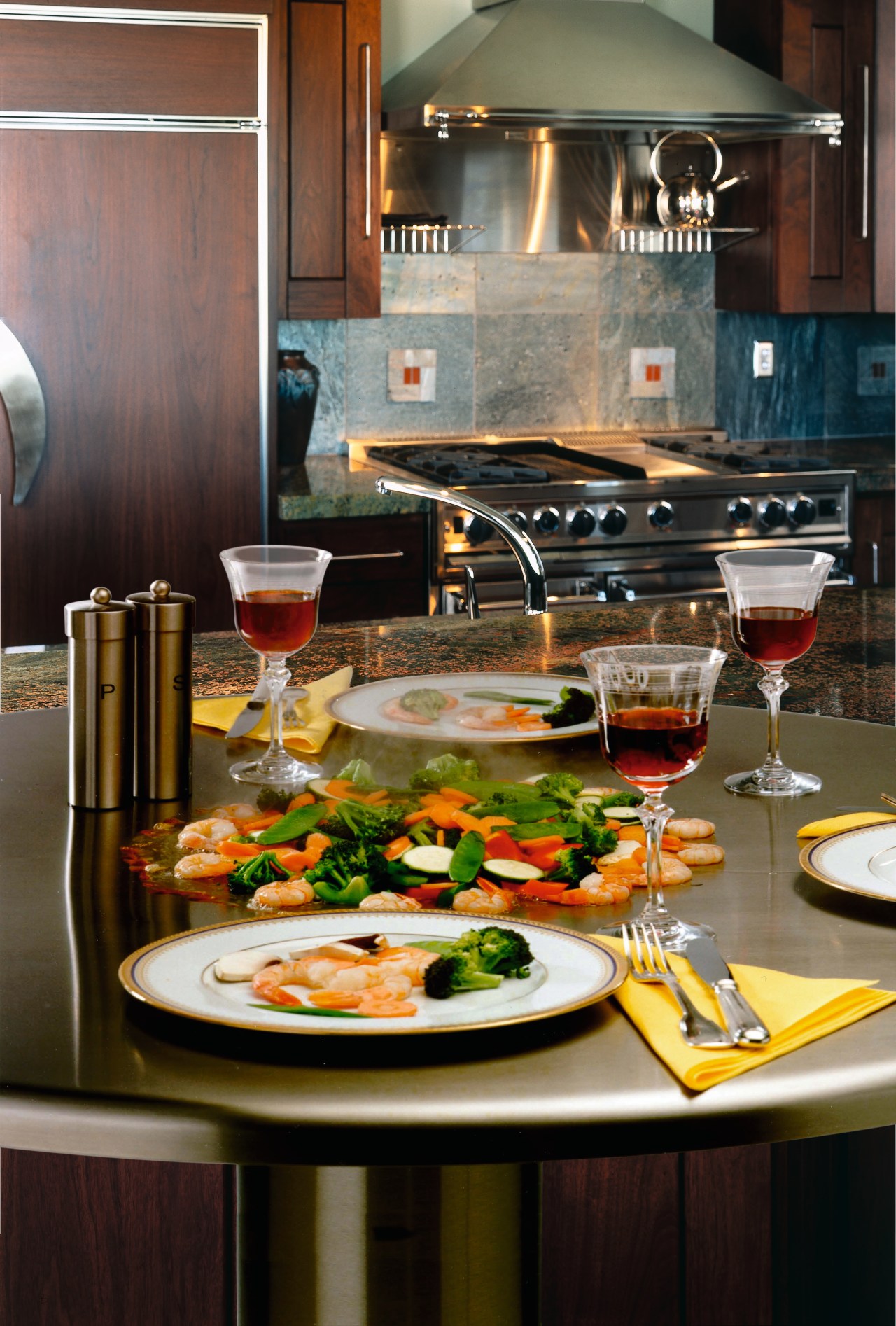 view of this kitchen featuring a cook-n-dine stainless brunch, countertop, cuisine, dish, food, kitchen, meal, table, black, brown