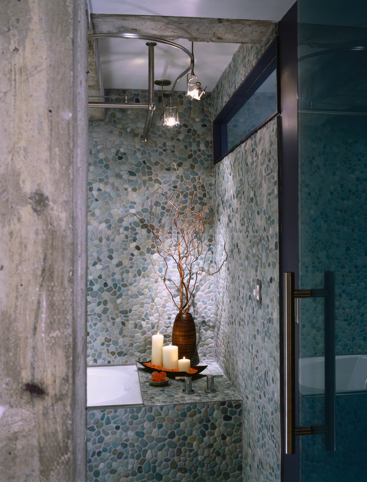 A close up view of the pebbled walls architecture, ceiling, glass, interior design, wall, window, gray, black