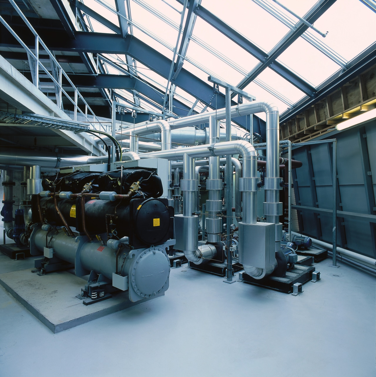 View of the plant room  at the engineering, factory, industry, machine, manufacturing, black, teal, gray