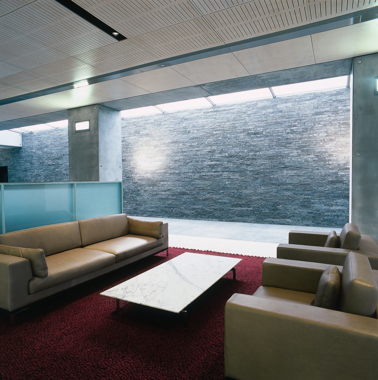 Aview of a seating area, grey tiled floor, architecture, ceiling, daylighting, floor, furniture, interior design, living room, table, wall, window, gray, black