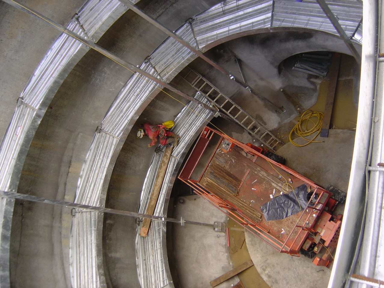 A view of some engineering work within a arch, gray