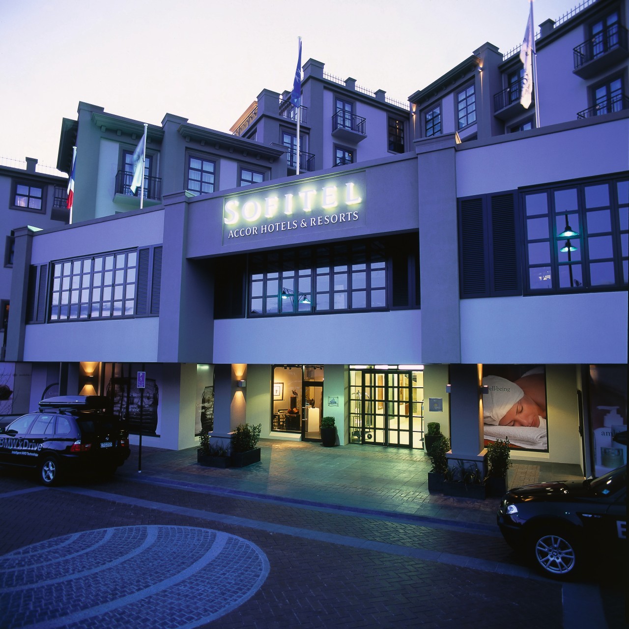 An exterior viewof the Soffitel hotel in Queenstown. architecture, building, condominium, facade, home, hotel, metropolitan area, mixed use, real estate, blue