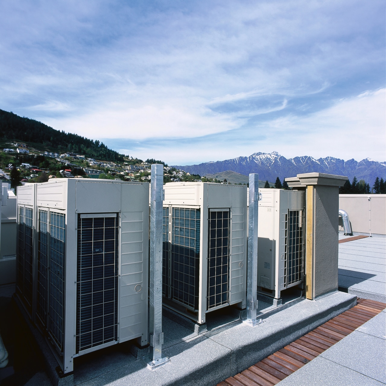 An exterior view of the heating and cooling architecture, building, facade, home, house, real estate, sky, window, white