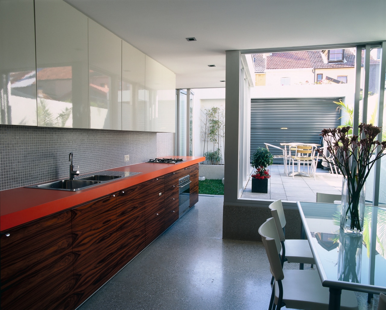 A view of a kitchen, polished concrete floor, architecture, countertop, interior design, kitchen, room, gray