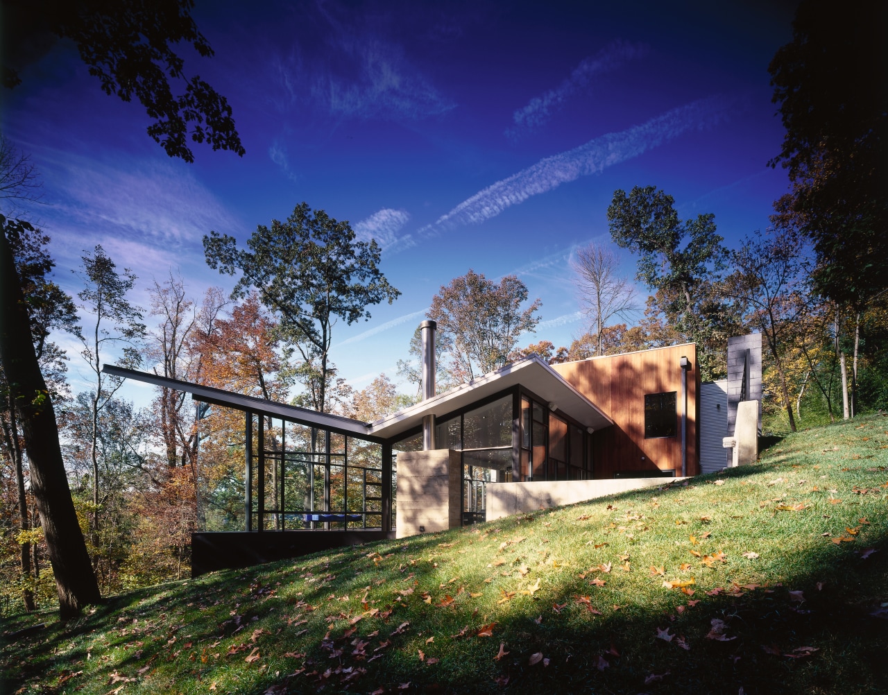 An exterior view of the entire house. architecture, cloud, cottage, estate, farmhouse, grass, home, house, landscape, nature, plant, property, real estate, rural area, sky, sunlight, tree, blue, black