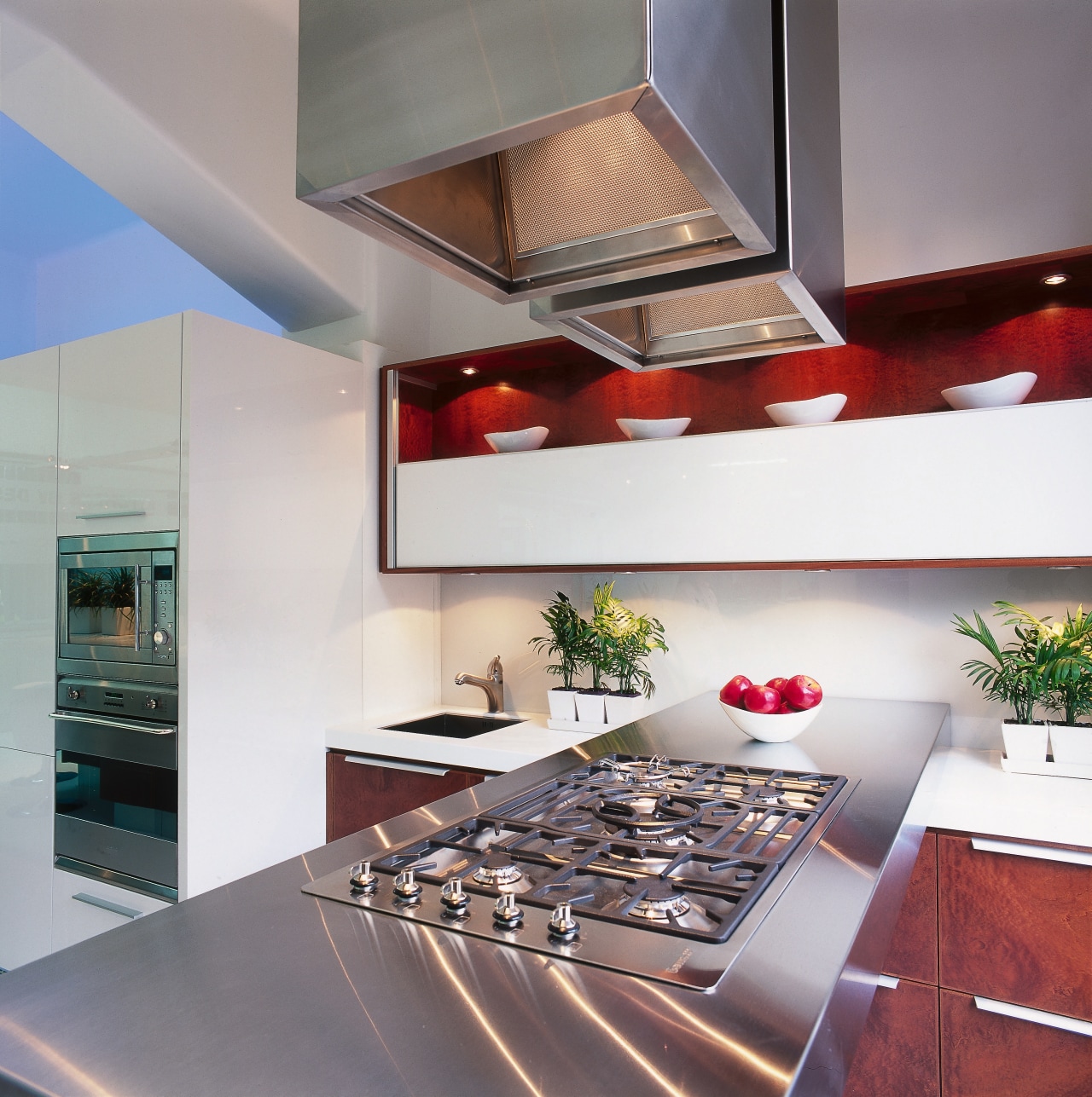 An example of the sleek appearance of a ceiling, countertop, interior design, kitchen, gray